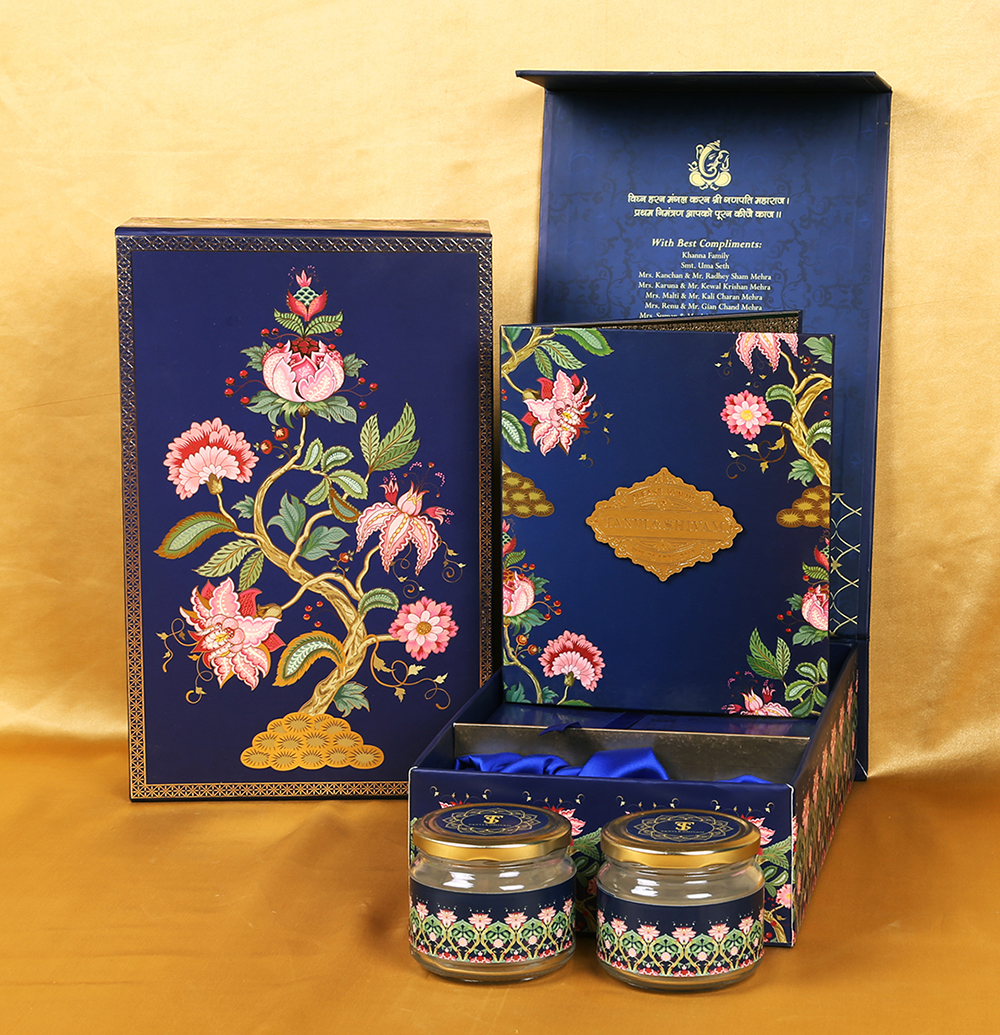 Elegant Sikh wedding box invite in royal blue with coloorful floral design