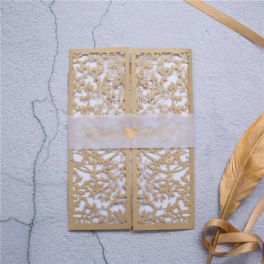 Gate fold wedding invitation in golden colour with a mesh of leaves