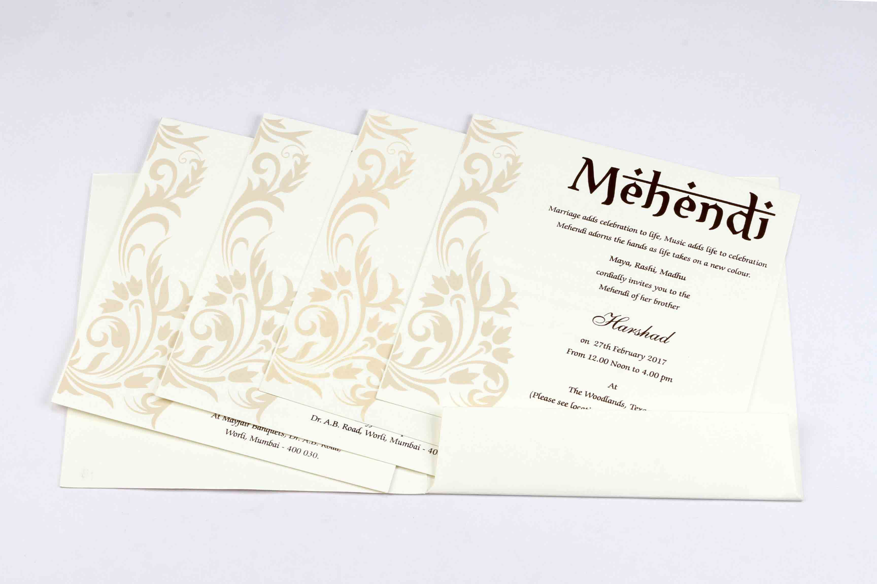 Hindu wedding invitation in off white with floral motifs in peach - Click Image to Close