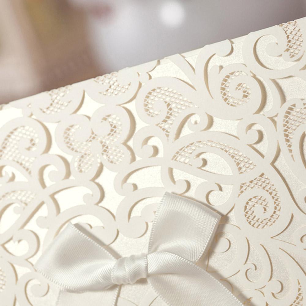 Ivory White Laser Cut Flower with Bowknot Wedding Invitations - Click Image to Close