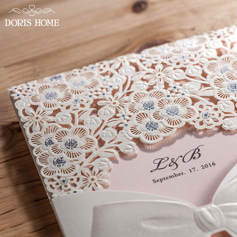 Laser Cut White Floral Wedding Invitation with a bow knot design - Click Image to Close