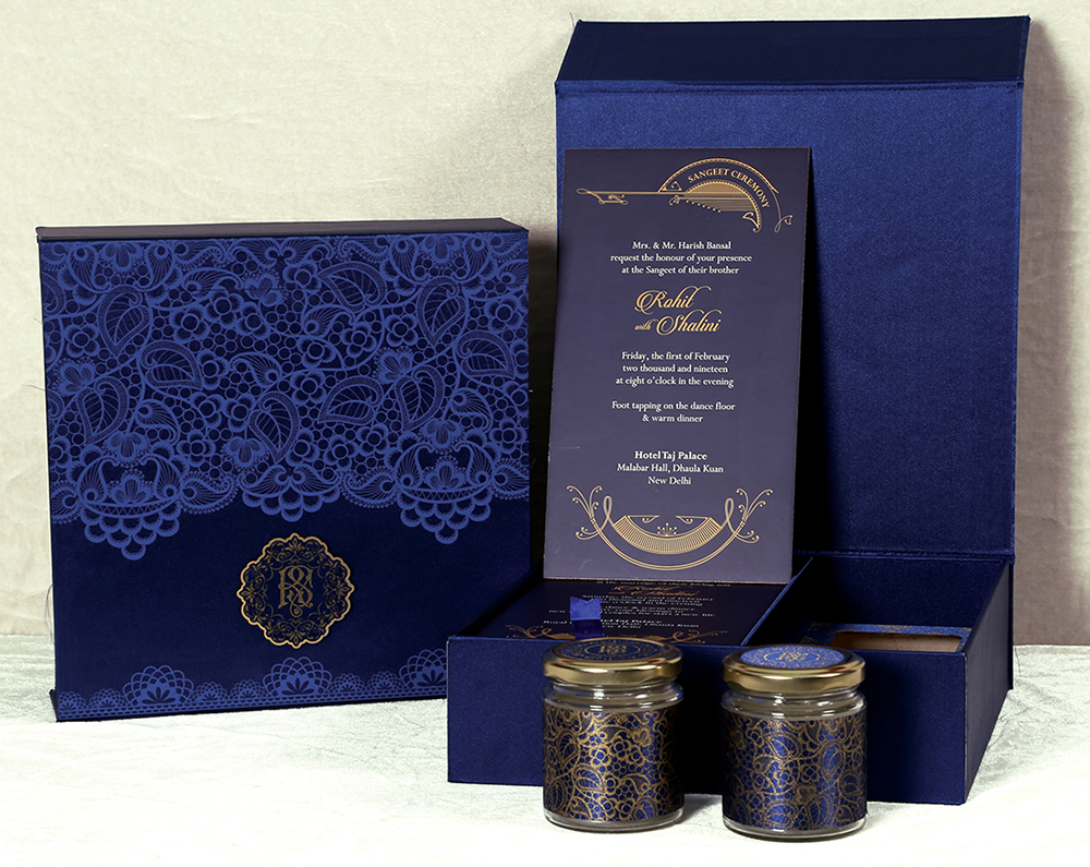 Royal blue Sikh wedding box invitation with floral patterns & sweet jars