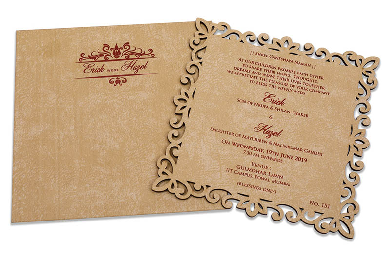 Square shaped cream color laser cut wedding invite in cardboard