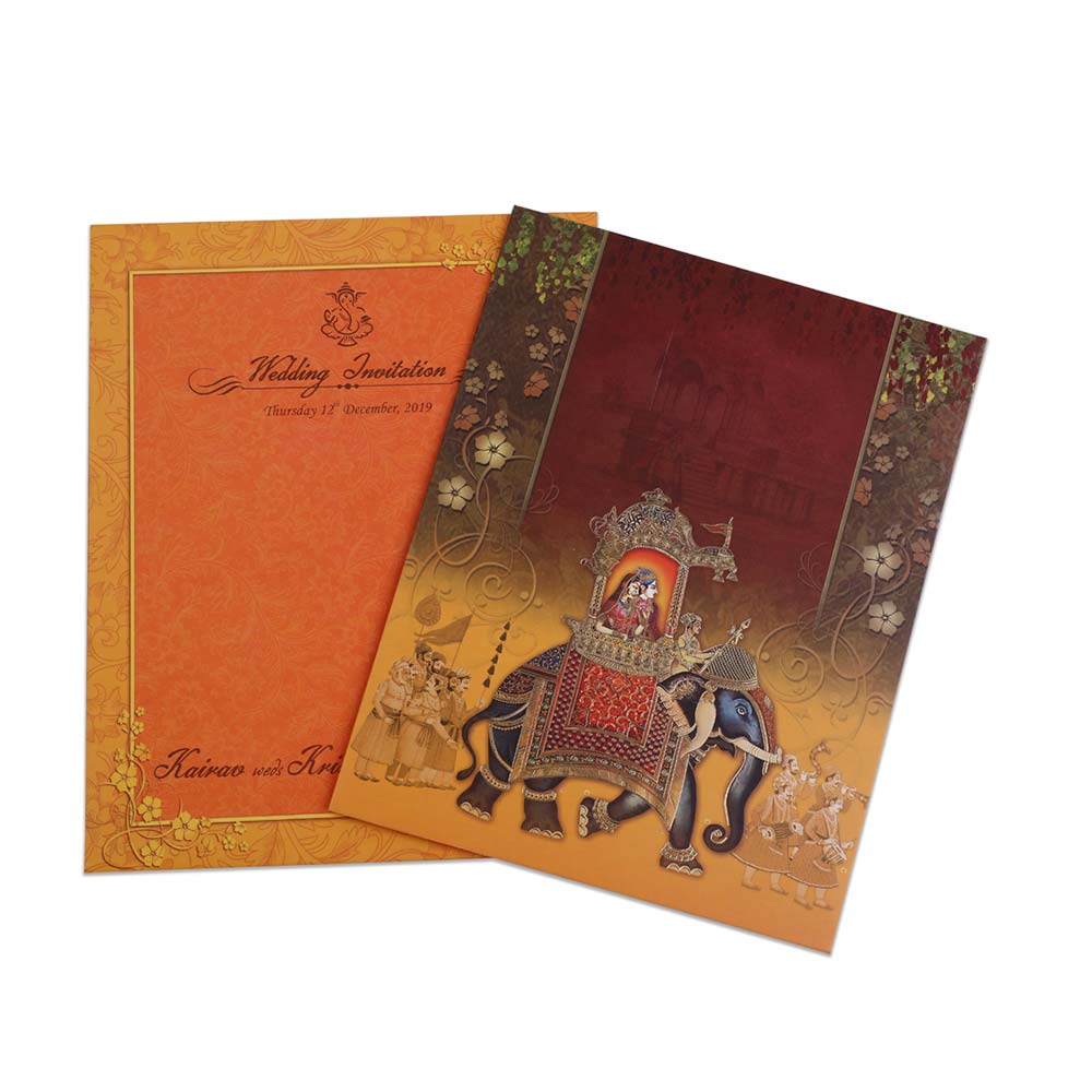 Traditional Indian wedding invitation card in brown color