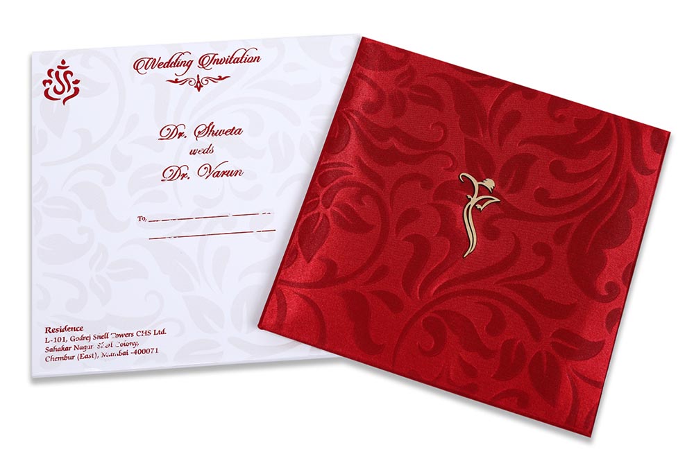 Traditional Indian wedding invitation in rich red satin finish