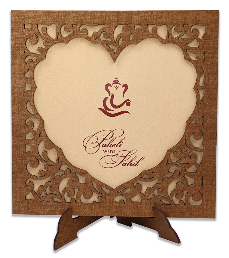 Wedding invitation in laser cut photo frame style with a heart design