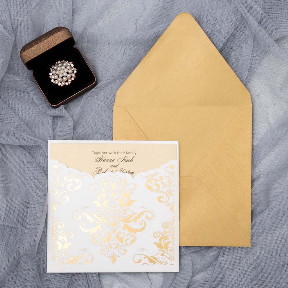 Wedding invitation with golden foil stamped insert holder pocket