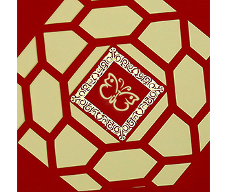 Laser cut Bengali wedding invite in red with satin finish.