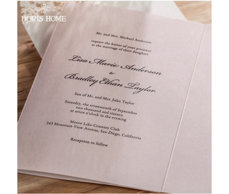 Laser Cut White Floral Wedding Invitation with a bow knot design