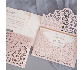 Laser cutt wedding invitation in shimmer blush and rose gold glitter