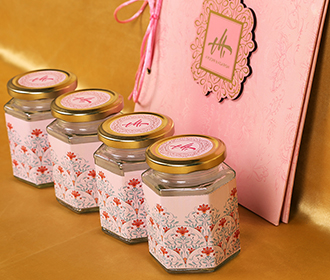 Lotus theme floral wedding boxed invite in pink colour with sweett jars