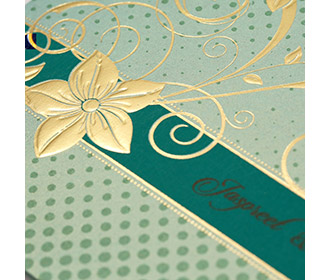 Modern floral Indian wedding card in mint green colour