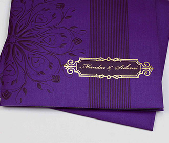Modern indian wedding invite in purple floral design