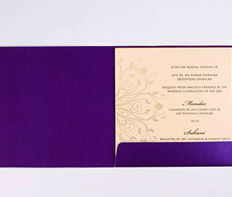 Modern indian wedding invite in purple floral design