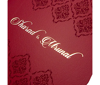 Multifaith wedding invitation card in red color with maroon color motifs