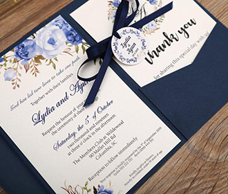 Navy blue color wedding invitation in floral theme