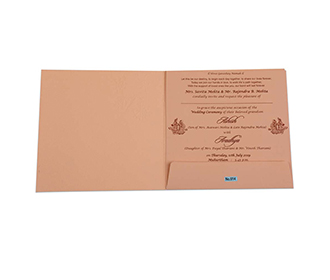 Peach colour Indian wedding invite with embossed flowers