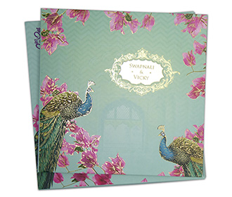 Peacock themed Indian wedding invitation in pastel green & purple