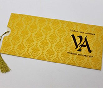 Pull out Indian wedding card in yellow golden with motifs in yellow