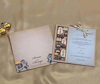 Rajasthani Royal Indian Wedding Card in Light Brown Colour
