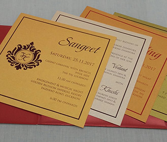 Red and gold invite with laser cut religious sikh symbol
