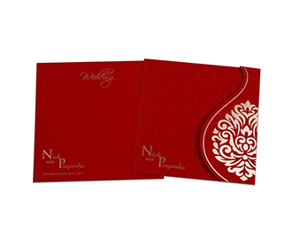 Red colour Indian wedding card with golden motifs