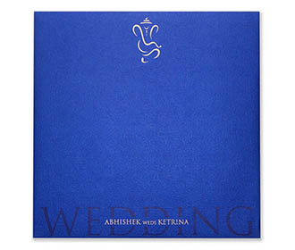 Royal blue cardboard invite with laser cut floral motifs