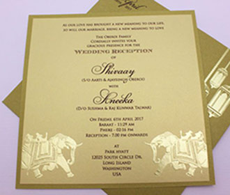 Royal Indian wedding card in golden with a pull out insert