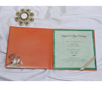 Royal Indian wedding invitation in beautiful orange colour