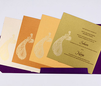 Sikh wedding invite in purple with golden paisley