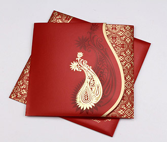 Sikh wedding invite in red with golden paisley