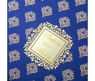 Tamil wedding invitation in blue with golden motifs