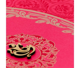 Beautiful pink invitation card with floral design and laser cut Ganesha