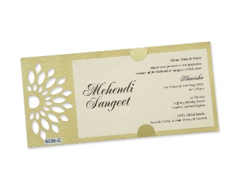 Elegant cream colour wedding invite with cut out motifs