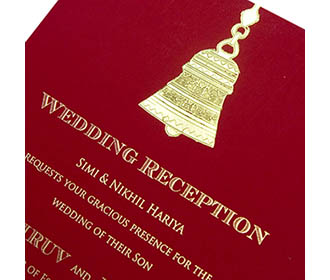 Wedding card in golden & red with a pull out insert & temple bell design