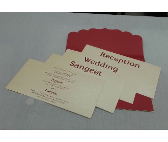 Stylish red and silver wedding invite with laser cut Ganesha design