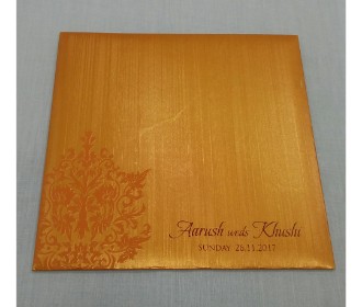 Orange and red invite with laser cut Ganesha