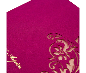 Wedding invitation card in vibrant pink with cut out design