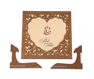Wedding invitation in laser cut photo frame style with a heart design