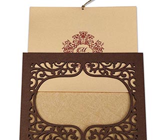 Wedding invitation in laser cut photo frame style with floral motifs