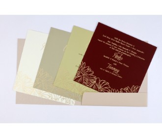Wedding invite in tan and golden with embossed floral design