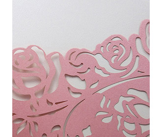 Wedding invite with a laser cut pocket in pastel pink roses