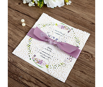 White gatefold laser cut engagement and weddding invitation card with pink ribbon