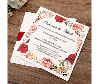 White gatefold laser cut engagement and weddding invitation card with red ribbon